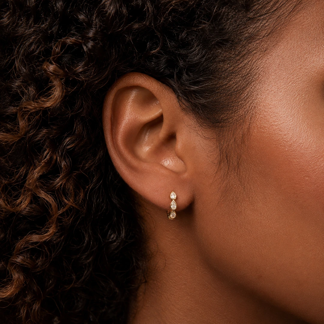 Bezeled Pear Huggie Earrings