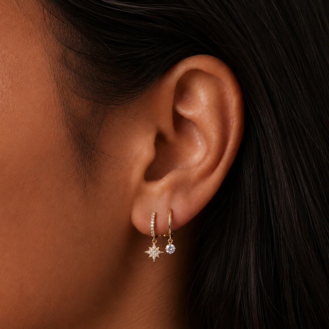 Star Illusion Huggie Earrings